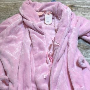 Woman’s pink fleece robe